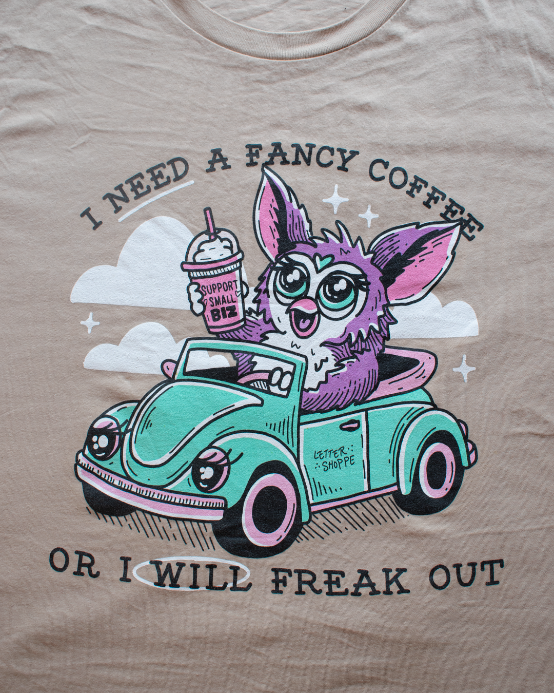 Furby Wants A Fancy Coffee: Tan Unisex Graphic Tee